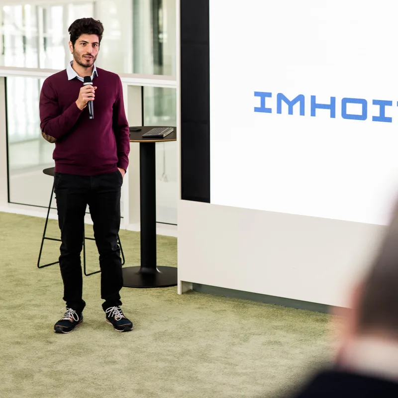 IMHOIT presenter on stage
