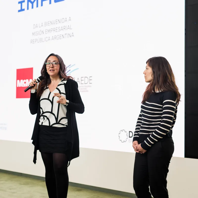 IMHOIT women presenters on stage